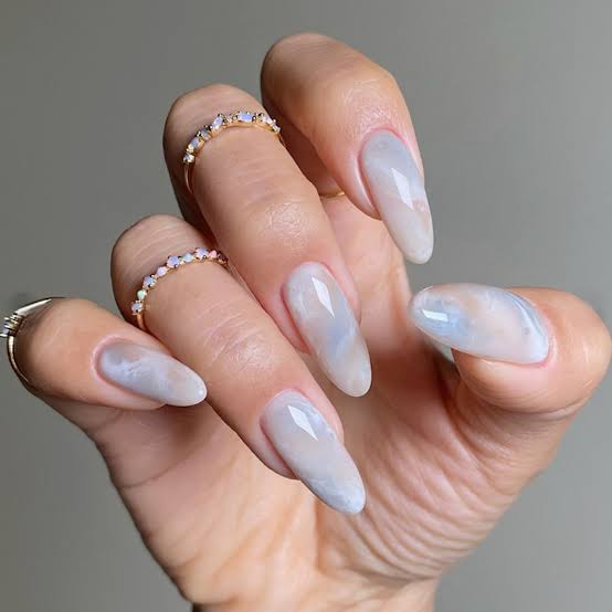 Medium Almond Milky Blue Swirl Glossy Nails Medium Almond Milky Blue Swirl Glossy Nails — Icy Blue Nails