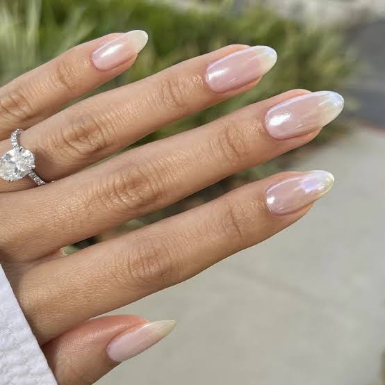 Milky Sheer Pink Short Almond Nails, Close-Up Take Milky Sheer Pink Short Almond Nails, Close-Up Take — Interview Nails