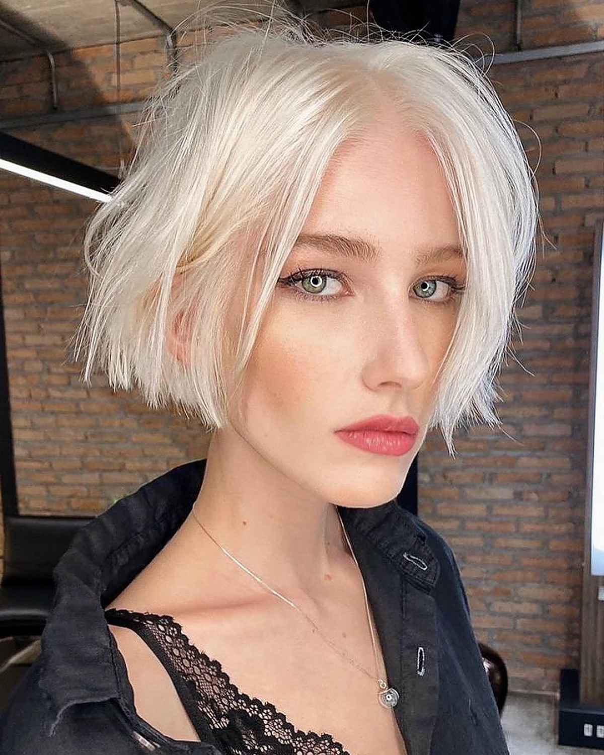 Sharp Platinum Blonde Blunt Bob Side Part Sharp Platinum Blonde Blunt Bob Side Part — Jaw Length Bob