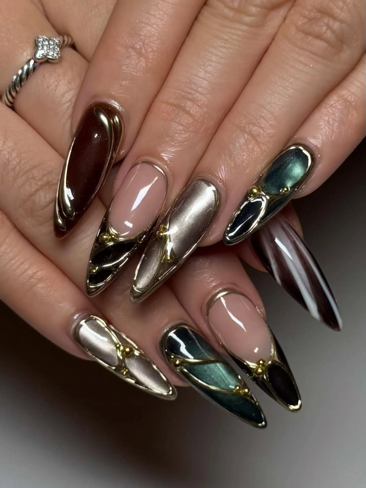 Futuristic Chrome and Gold Bead Long Stiletto Nails Futuristic Chrome and Gold Bead Long Stiletto Nails — Jewel Tone Nails