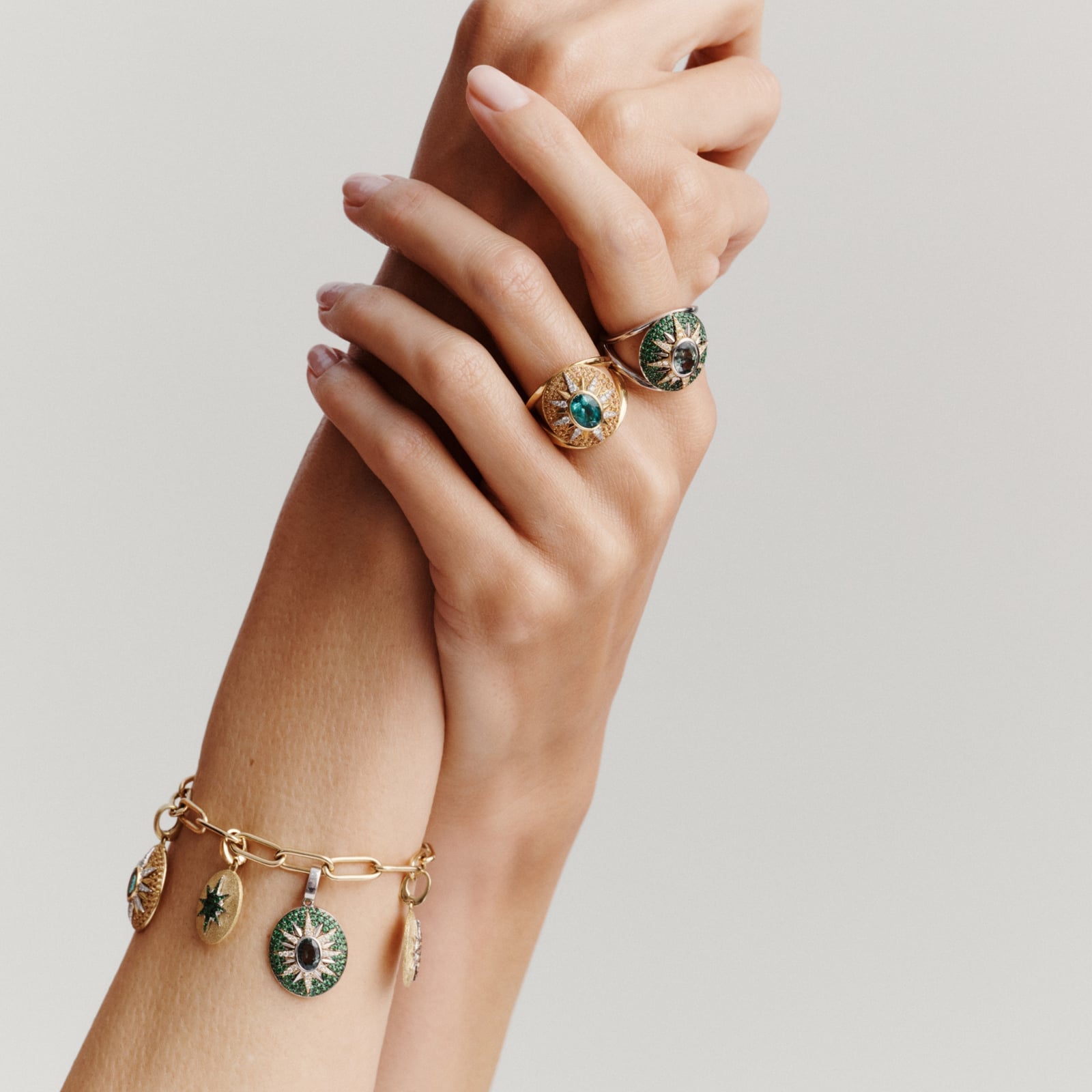 Gold Charm Bracelet With Gemstone Rings — Jewelry Trends