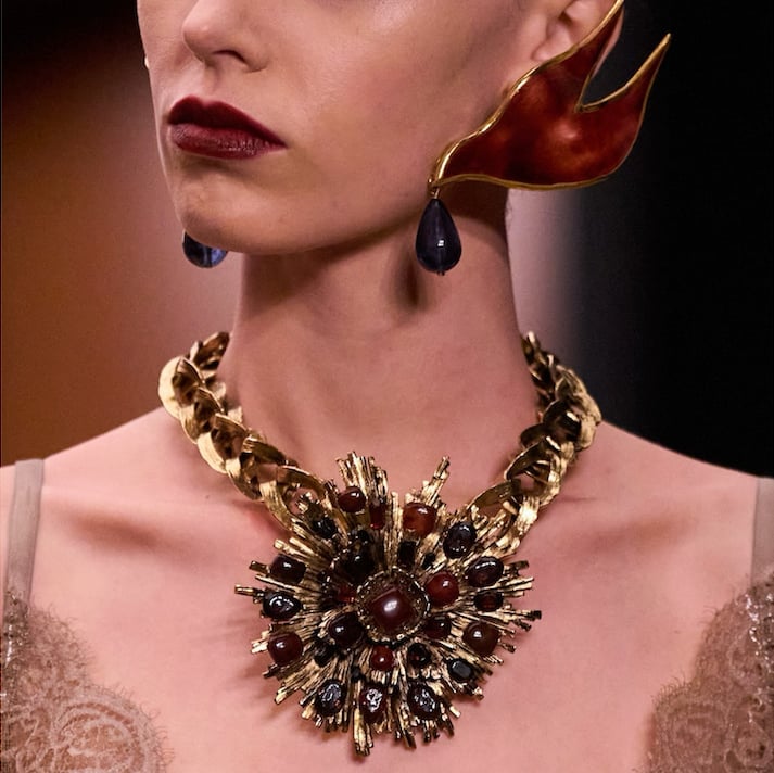 Ornate Gold Statement Necklace With Red And Blue Stones — Jewelry Trends