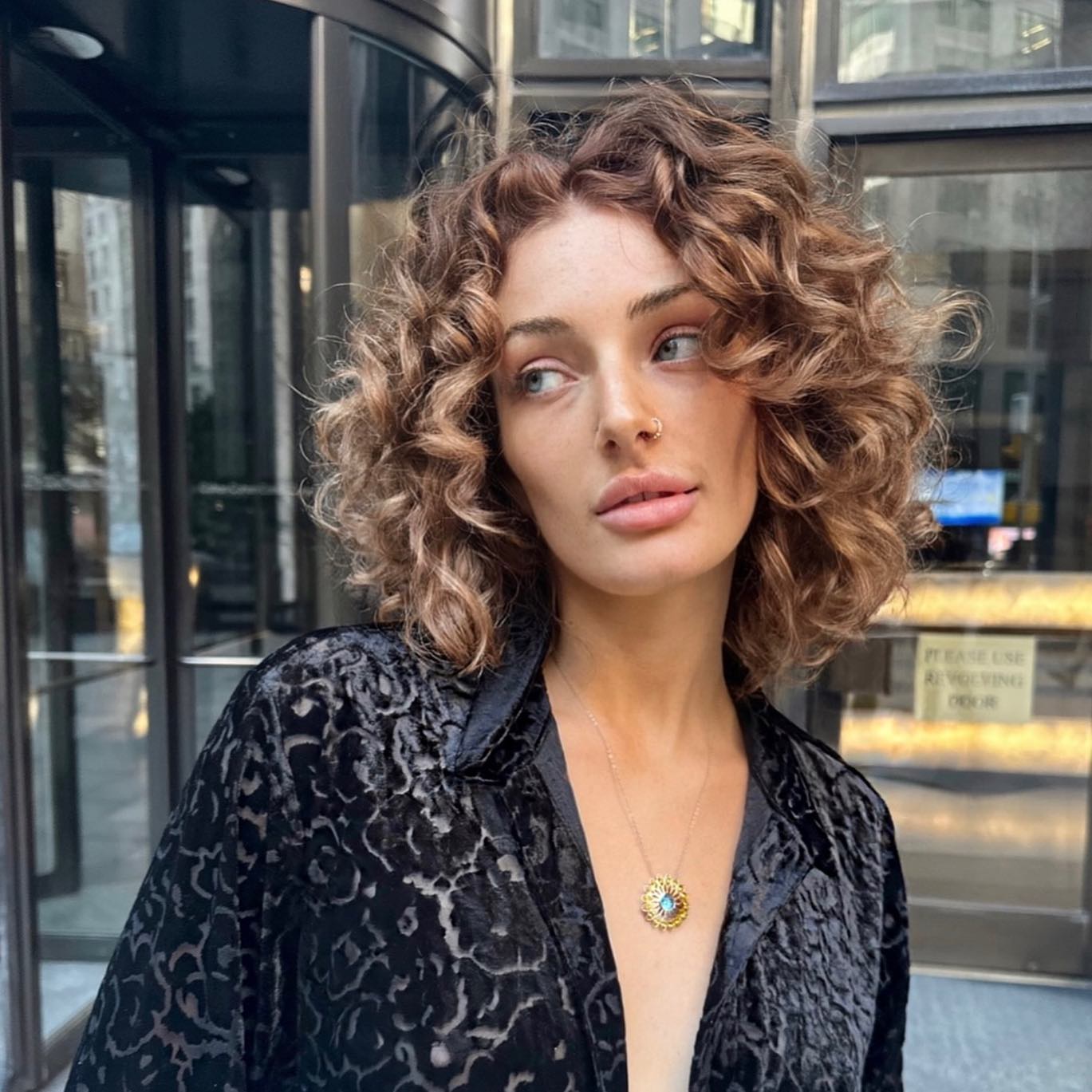 Collarbone Bob With Natural Curls And Balayage — Layered Bob