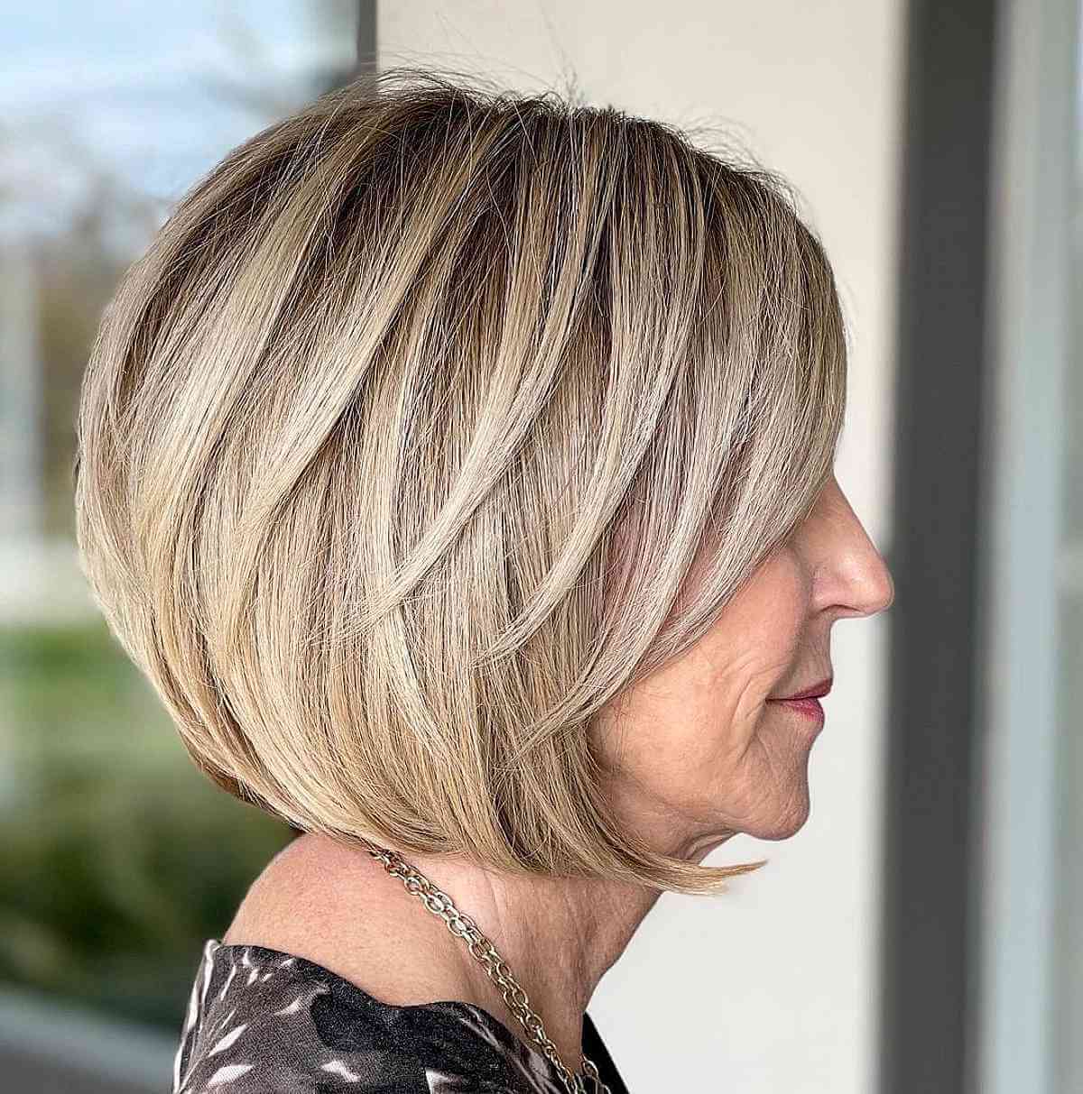 Chin Length Layered Bob With Ash Blonde Tones