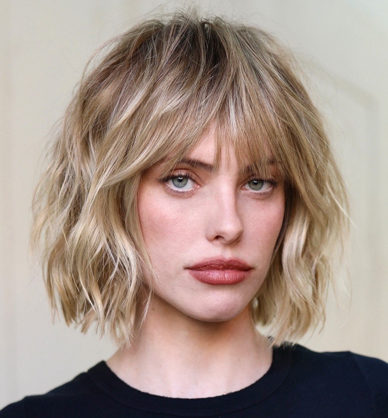Chin Length Ash Blonde Bob With Curtain Bangs — Layered Bob