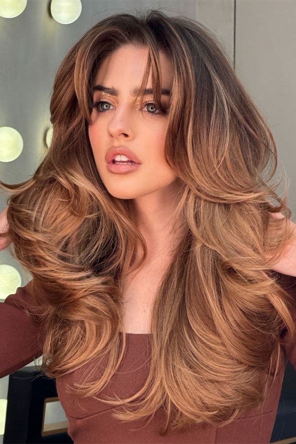 Long Warm Blonde Balayage With Face-Framing Layers and Curtain Bangs Long Warm Blonde Balayage With Face-Framing Layers and Curtain Bangs — Layered Hair
