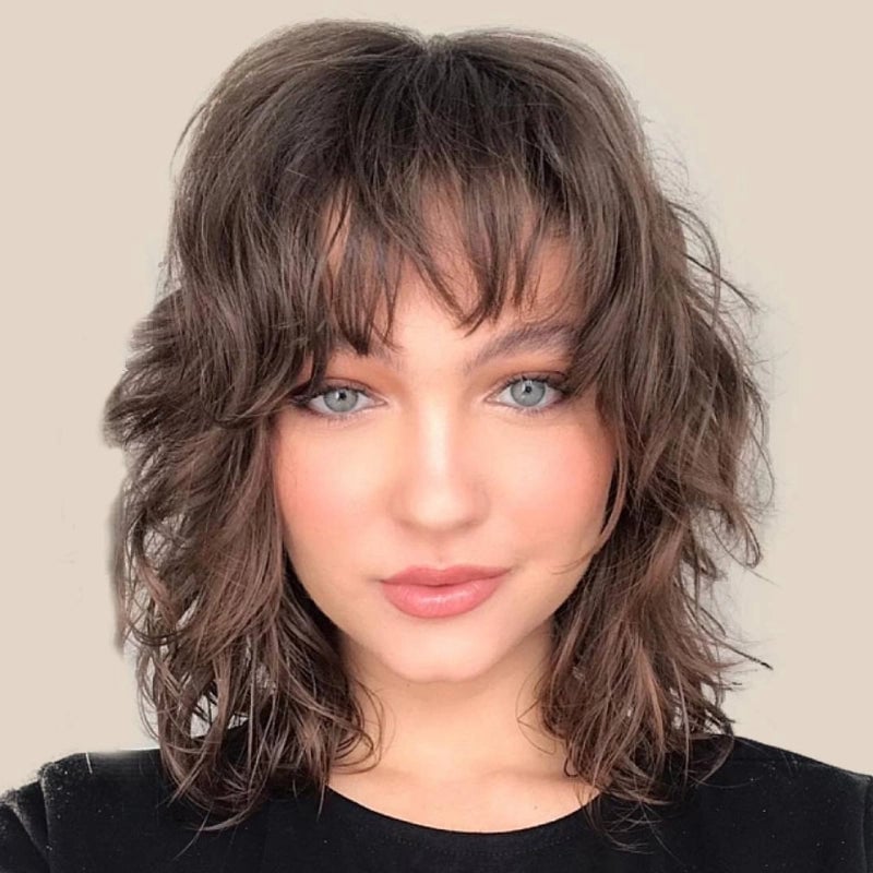 Collarbone Shag With Choppy Bangs and Subtle Highlights Collarbone Shag With Choppy Bangs and Subtle Highlights — Layered Hair