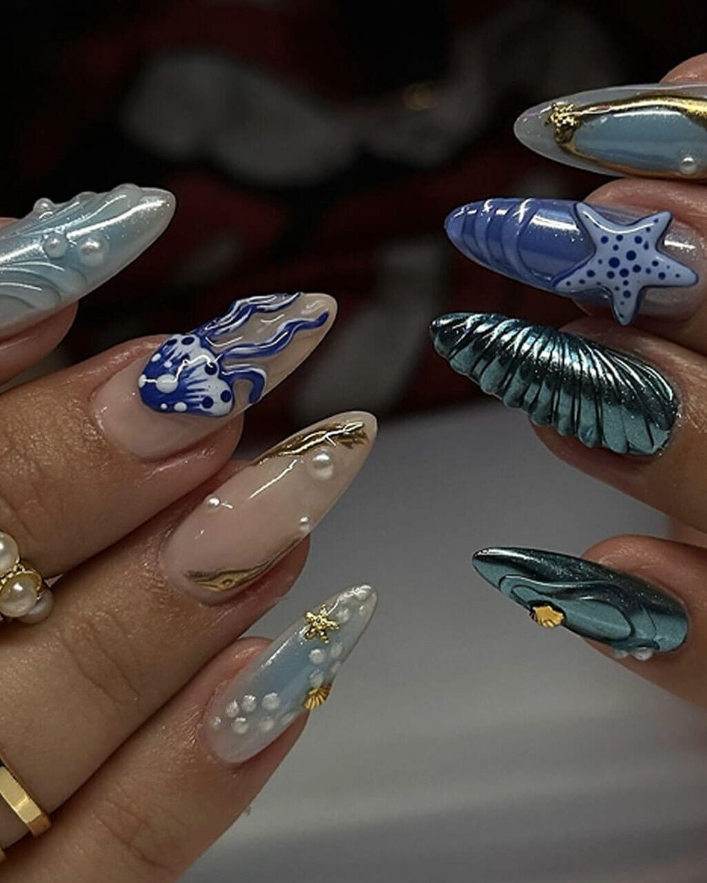 Nude 3D Sea Element Pearl Foil Almond Nails Nude 3D Sea Element Pearl Foil Almond Nails — Long Almond Nails