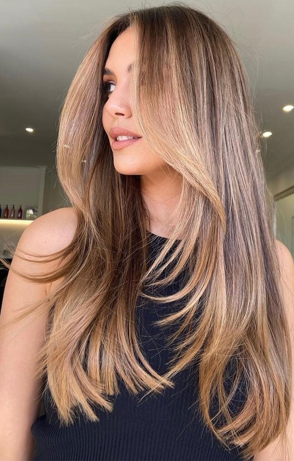 Light Brown With Blonde Highlights And Layered Volume Light Brown With Blonde Highlights And Layered Volume — Long Haircuts
