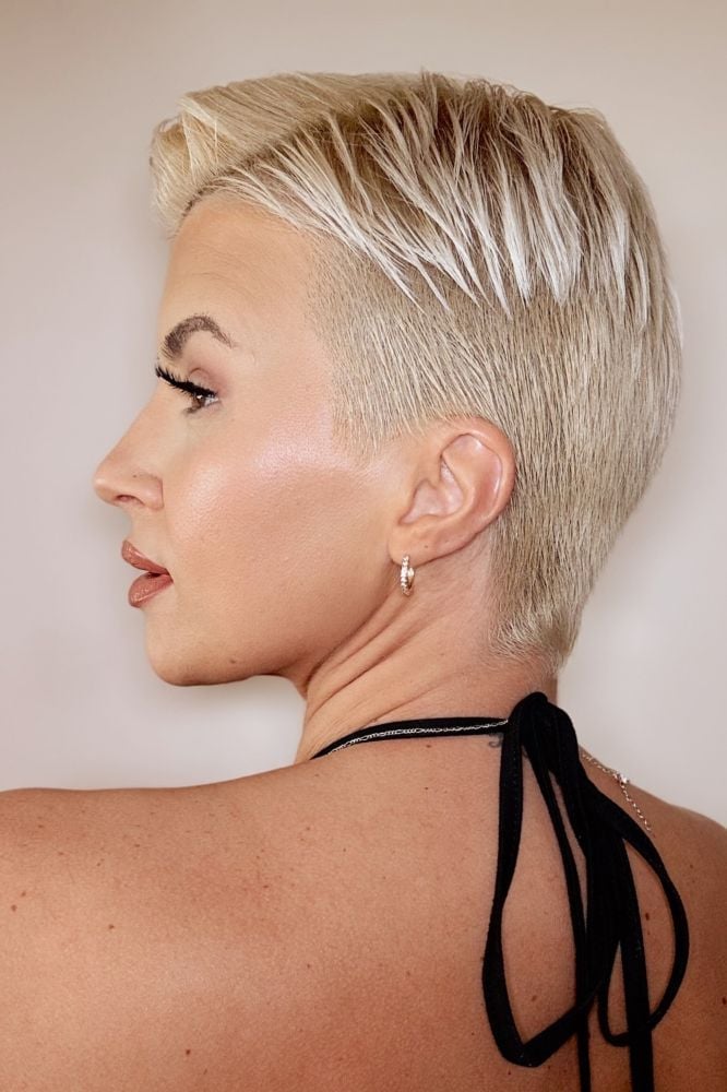 Textured Ash Blonde Pixie Tapered Nape, Close-Up Take Textured Ash Blonde Pixie Tapered Nape, Close-Up Take — Long Pixie
