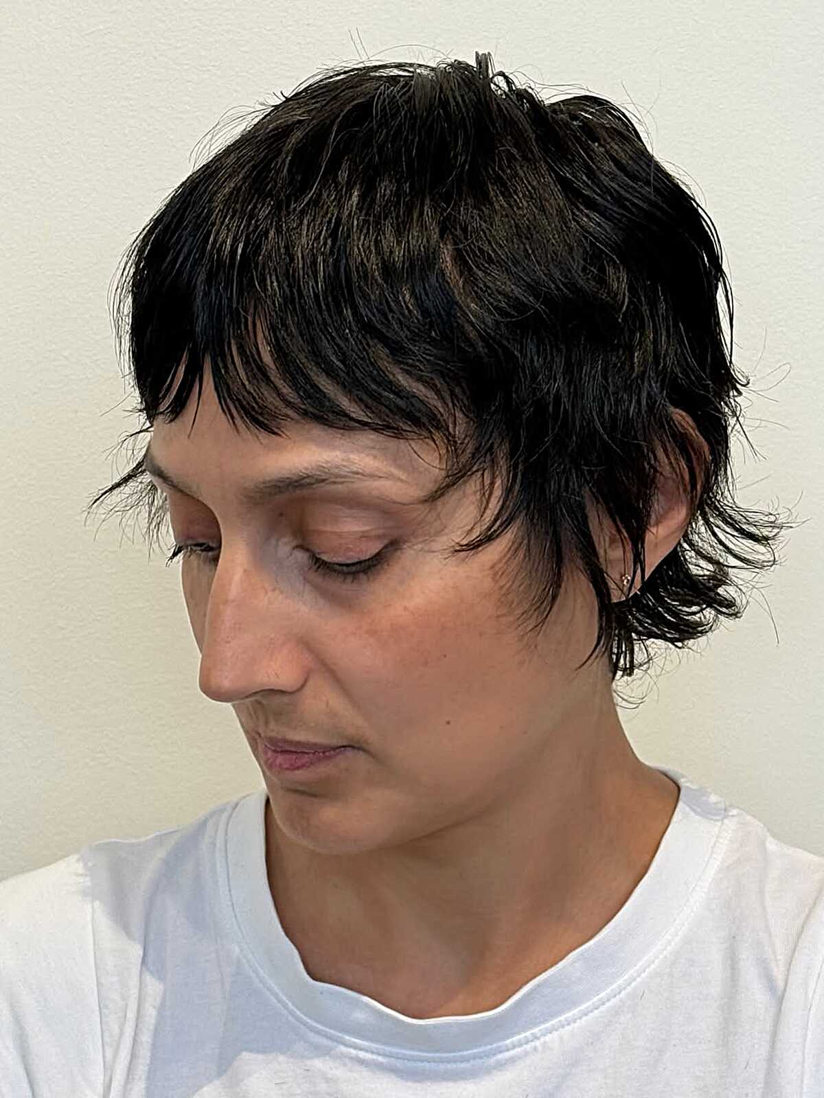 Black Shag Pixie With Choppy Fringe Black Shag Pixie With Choppy Fringe — Long Pixie