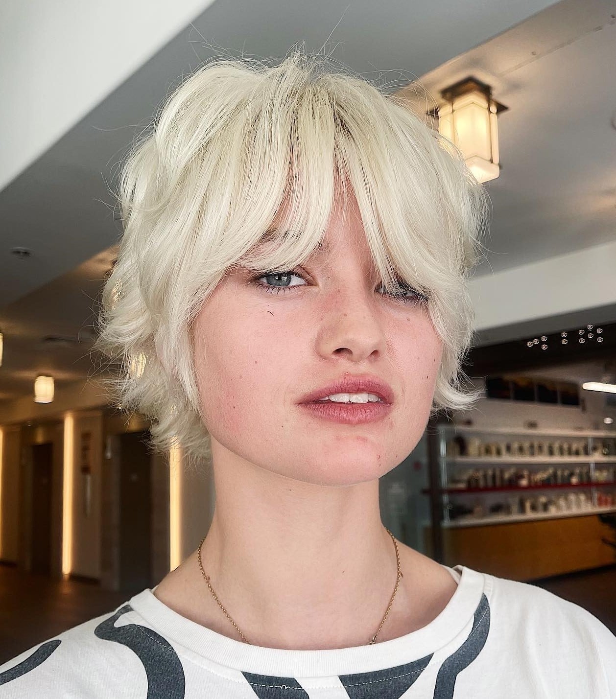 Platinum Blonde Pixie With Curtain Bangs Platinum Blonde Pixie With Curtain Bangs — Long Pixie