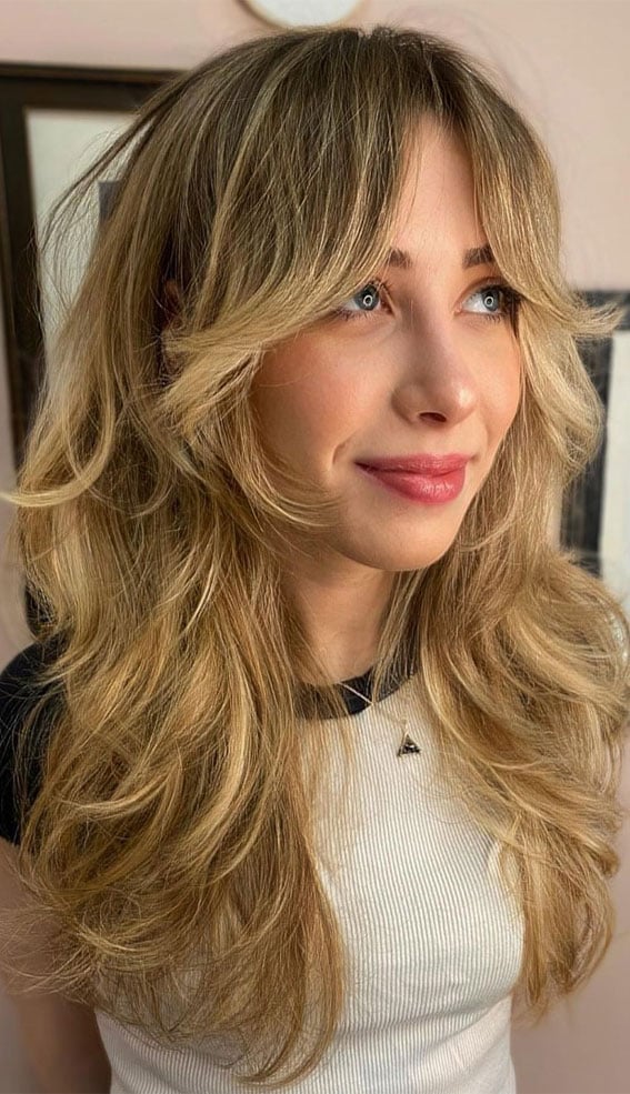 Mid-Length Blonde Shag With Curtain Bangs Mid-Length Blonde Shag With Curtain Bangs — Long Shag