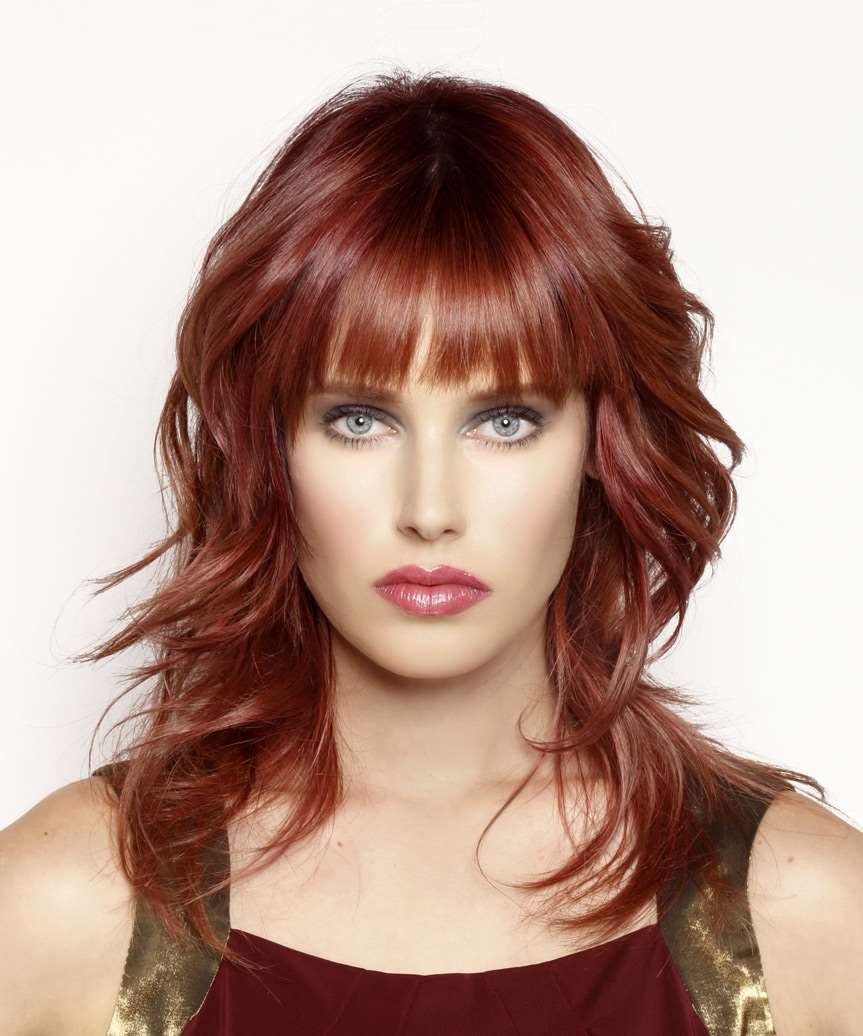 Shoulder Shag With Vibrant Red Blunt Bangs Shoulder Shag With Vibrant Red Blunt Bangs — Long Shag