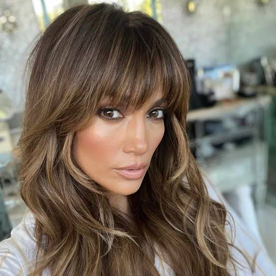Shoulder Honey Blonde Wolf Cut With Wispy Bangs Shoulder Honey Blonde Wolf Cut With Wispy Bangs — Long Wolf Cut