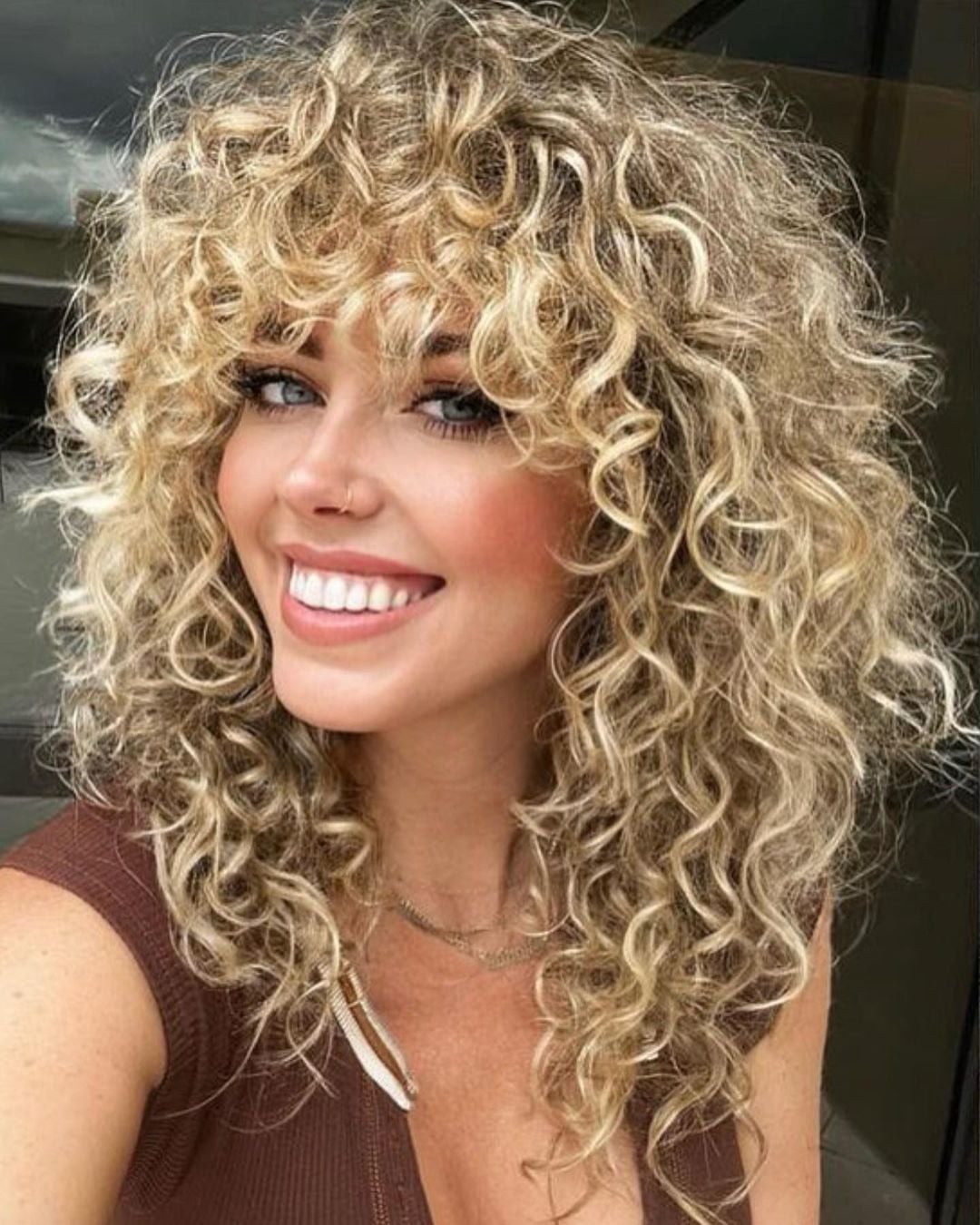 Ash Blonde Shoulder Wolf Cut With Curly Bangs Ash Blonde Shoulder Wolf Cut With Curly Bangs — Long Wolf Cut