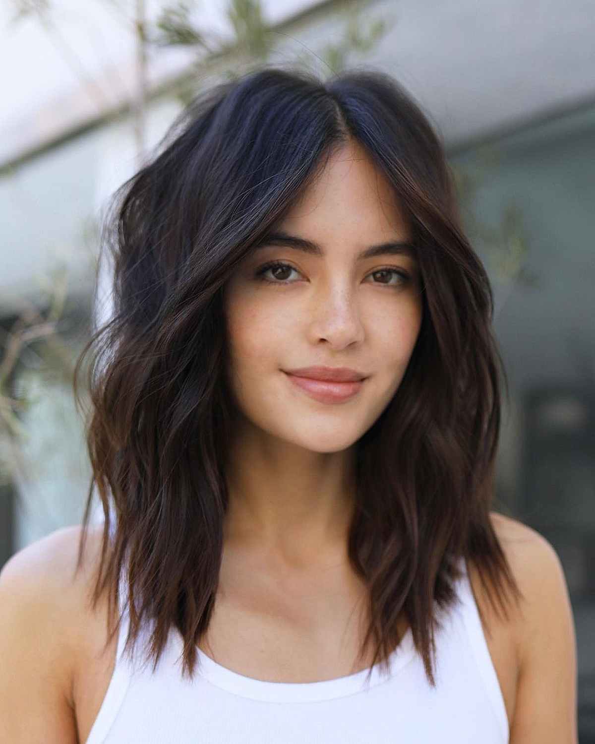 Dark Brown Layered Lob With Curtain Bangs, Wavy Blowout Dark Brown Layered Lob With Curtain Bangs, Wavy Blowout — Low Maintenance Haircuts