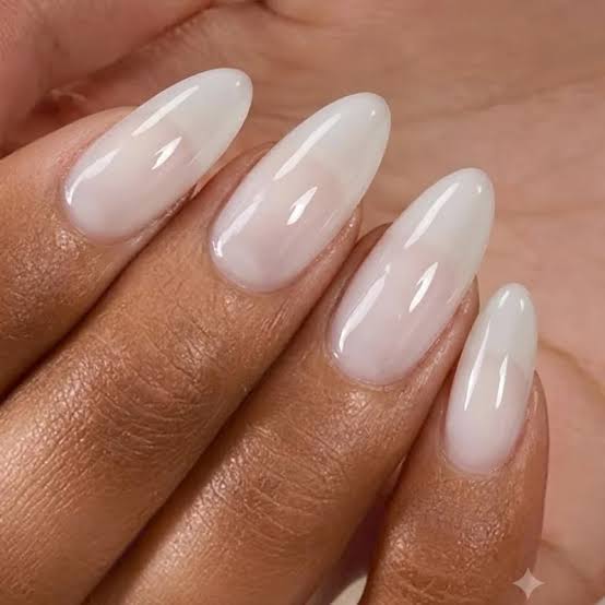 Sheer Nude Pink Glossy Short Oval Nails, Close-Up Take Sheer Nude Pink Glossy Short Oval Nails, Close-Up Take — Low Maintenance Nails