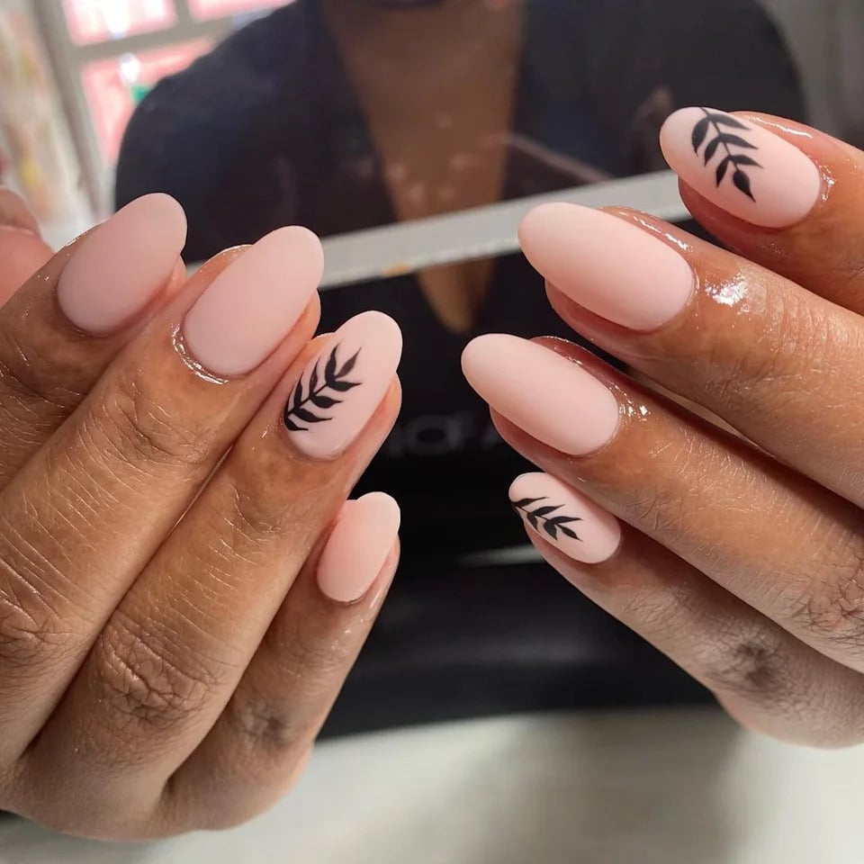 Pale Pink Matte Nails with Black Leaf Motif