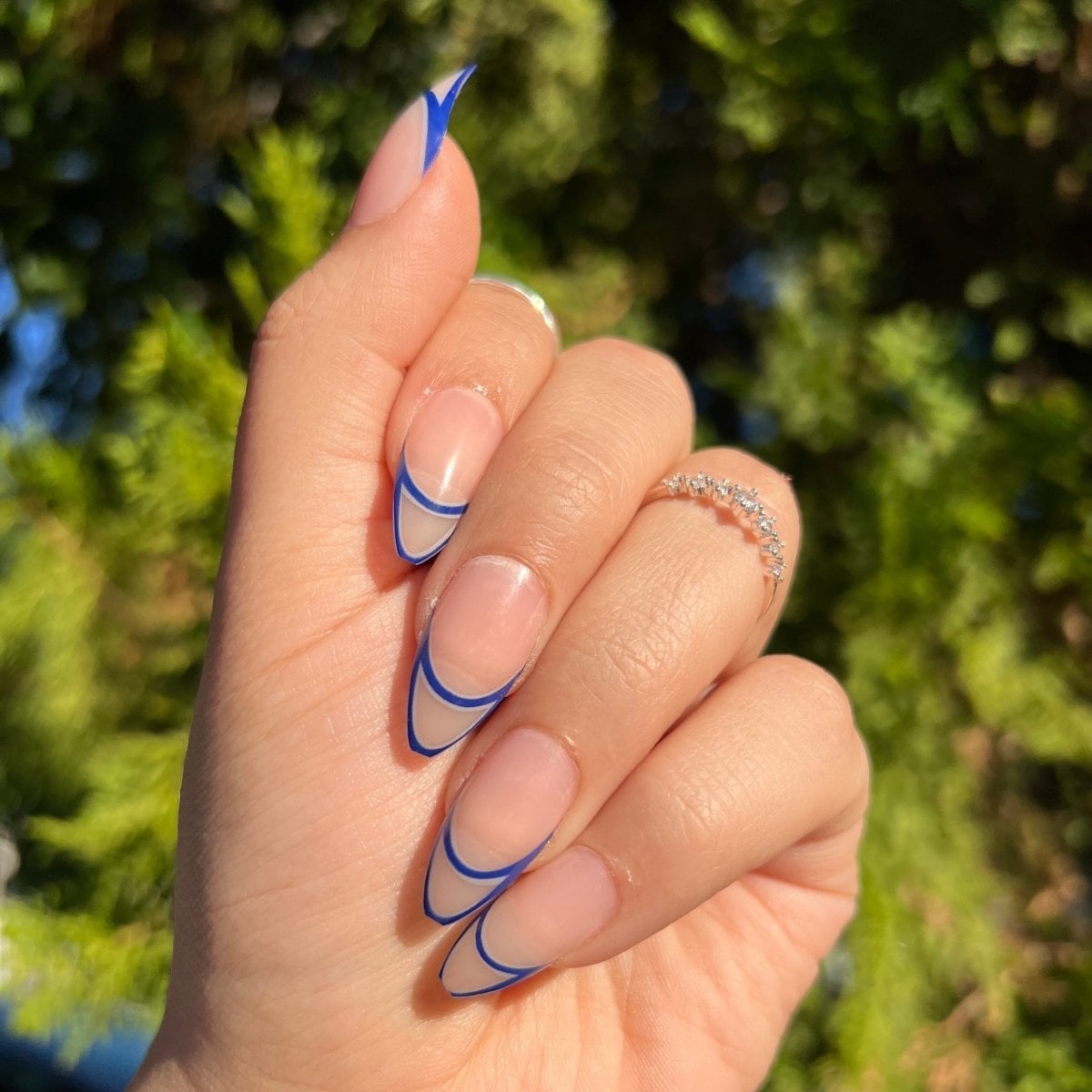 Nude Bright Blue Line Art French Medium Almond Nails Nude Bright Blue Line Art French Medium Almond Nails