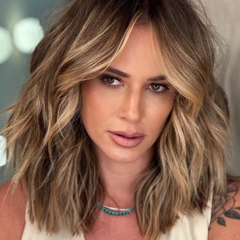 Caramel Balayage Layers With Curtain Bangs — Medium Haircuts