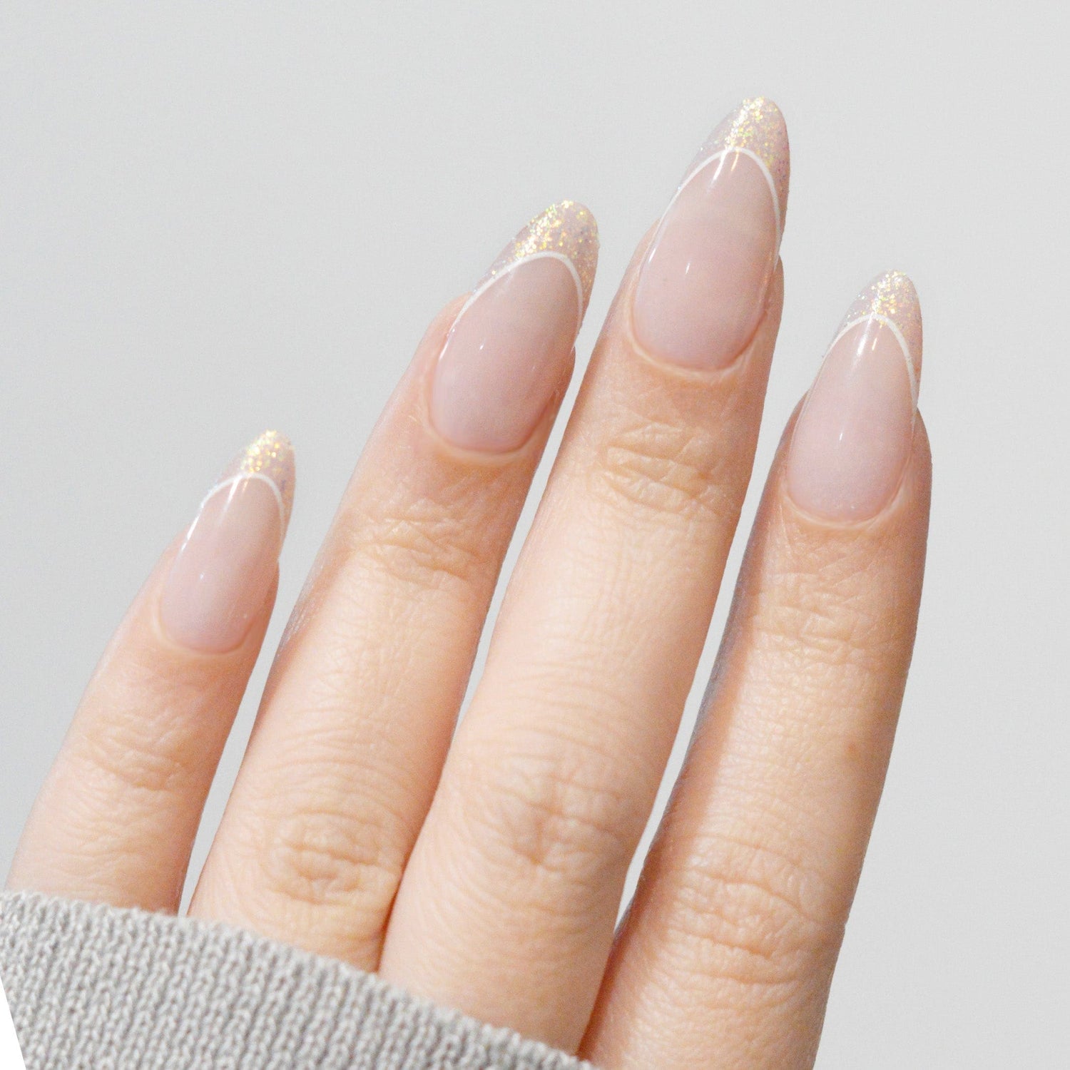 Sheer Nude Glitter French Tip Medium Almond Nails Sheer Nude Glitter French Tip Medium Almond Nails — Medium Nails