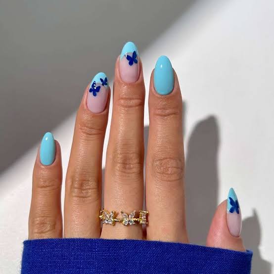 Solid Light Blue Butterfly Decal Medium Almond Nails Solid Light Blue Butterfly Decal Medium Almond Nails — Medium Nails