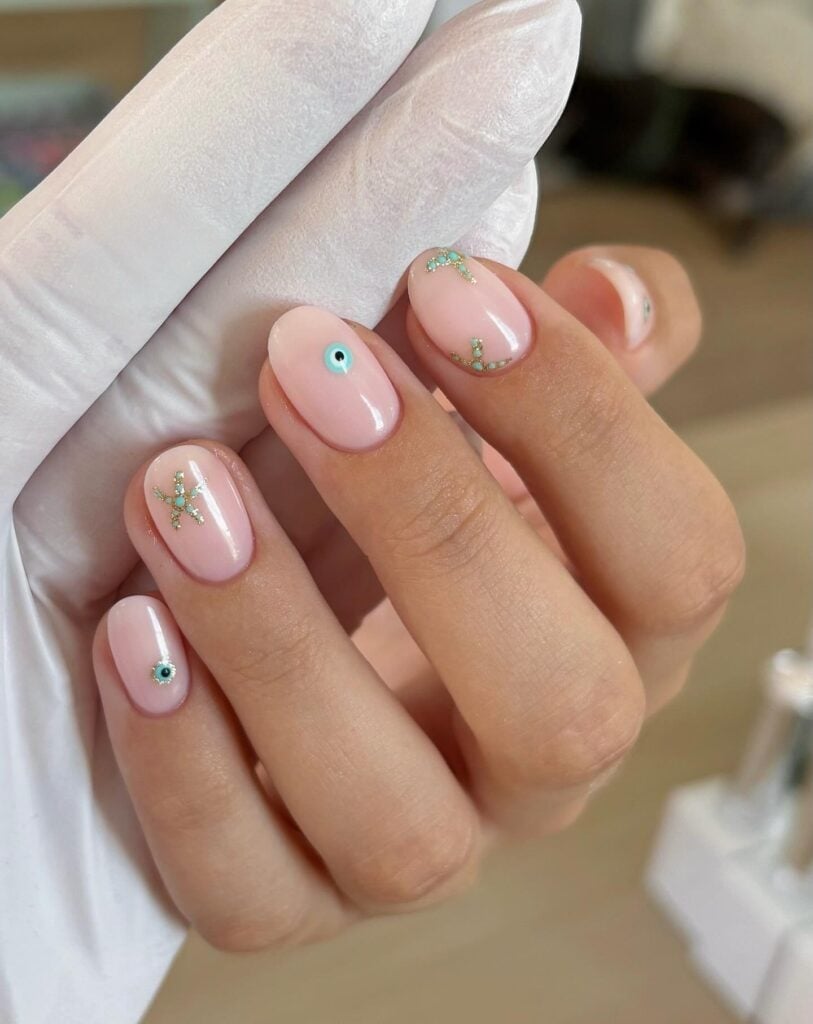 Short Oval Nails With Evil Eye Charm — Minimalist Nails