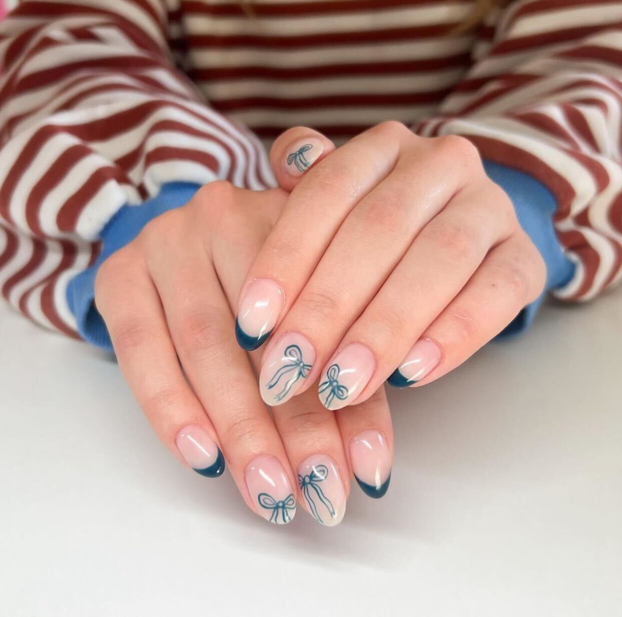 Short Almond Teal French Tip With Bow Art — Minimalist Nails