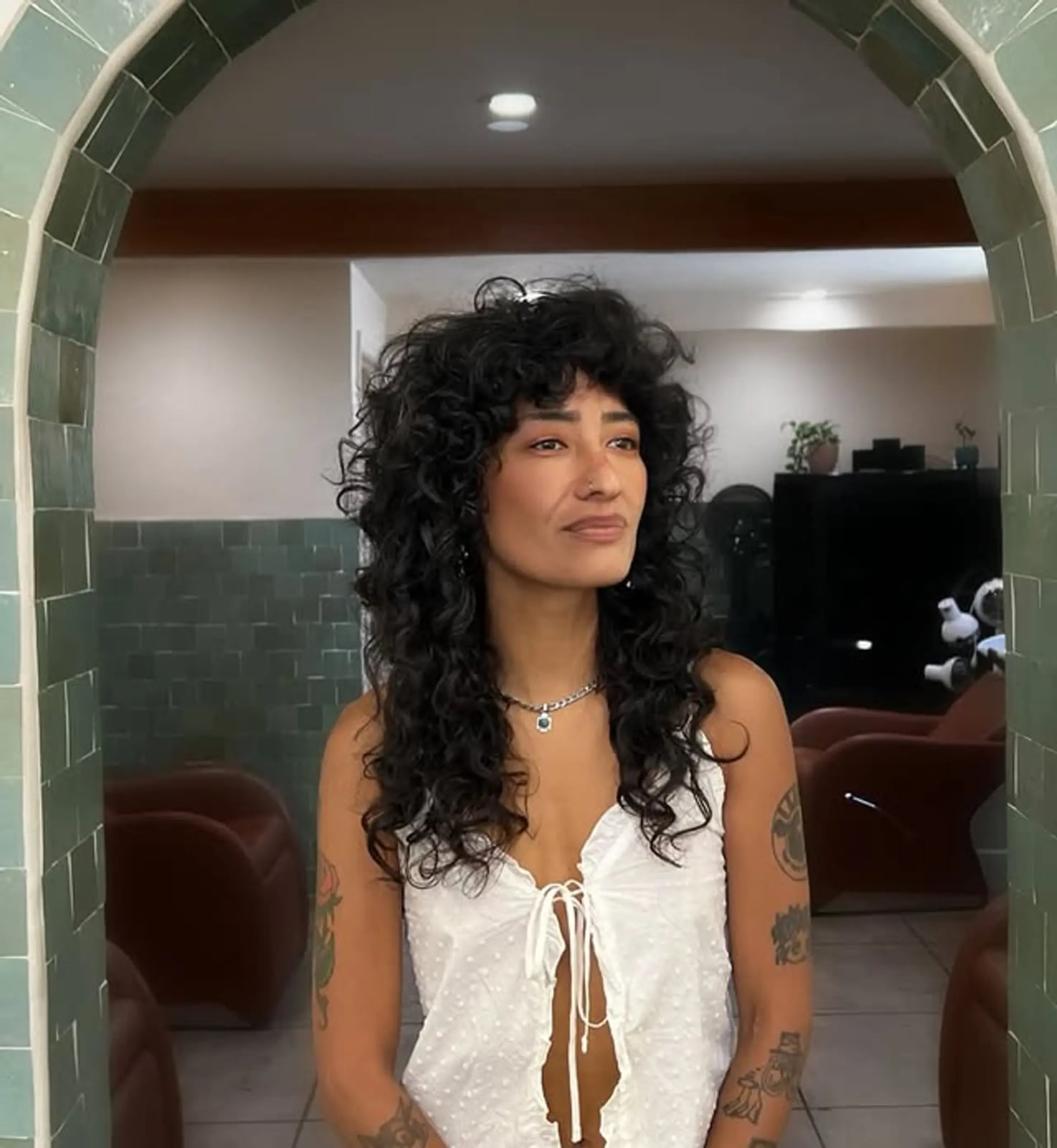 Layered Curly Shag With Curly Bangs — Modern Shag