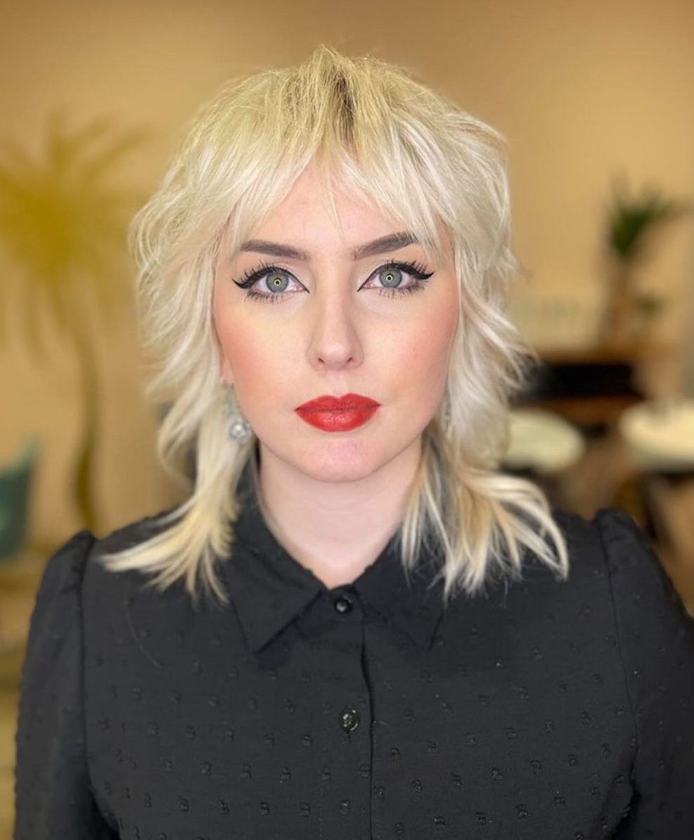 Ash Blonde Shag With Choppy Bangs — Modern Shag