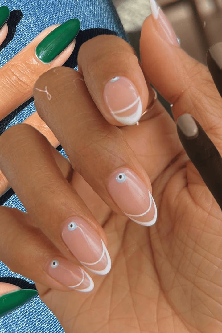 Nude Double French Eye Motif Medium Oval Nails Nude Double French Eye Motif Medium Oval Nails — Nail Shapes