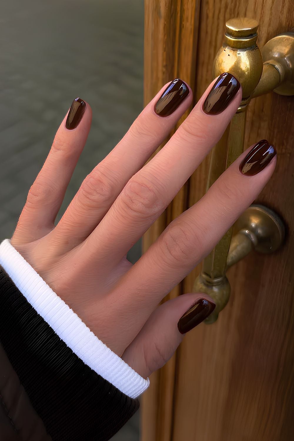 Glossy Deep Brown Short Oval Nails, Close-Up Take Glossy Deep Brown Short Oval Nails, Close-Up Take — Nails for Brunettes