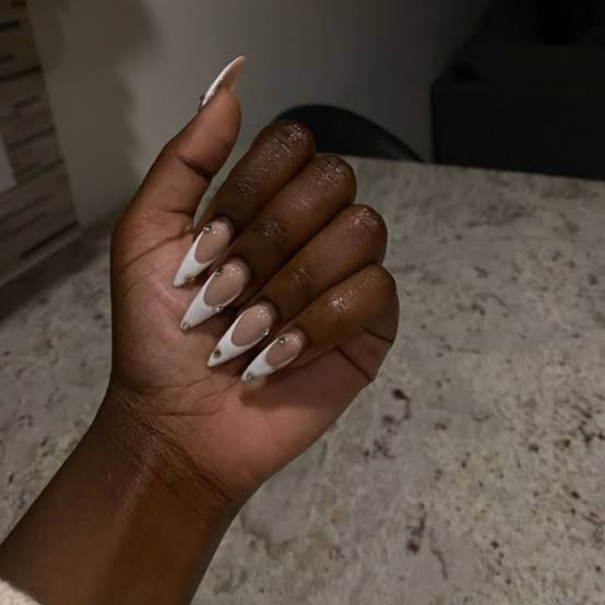 Long Stiletto Nude With White French and Silver Glitter Base Long Stiletto Nude With White French and Silver Glitter Base — Nails for Dark Skin