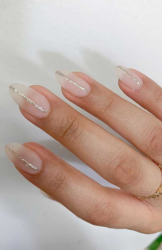 Sheer Milky White Short Almond Nails with Silver Glitter Line Sheer Milky White Short Almond Nails with Silver Glitter Line — Nails for Everyday