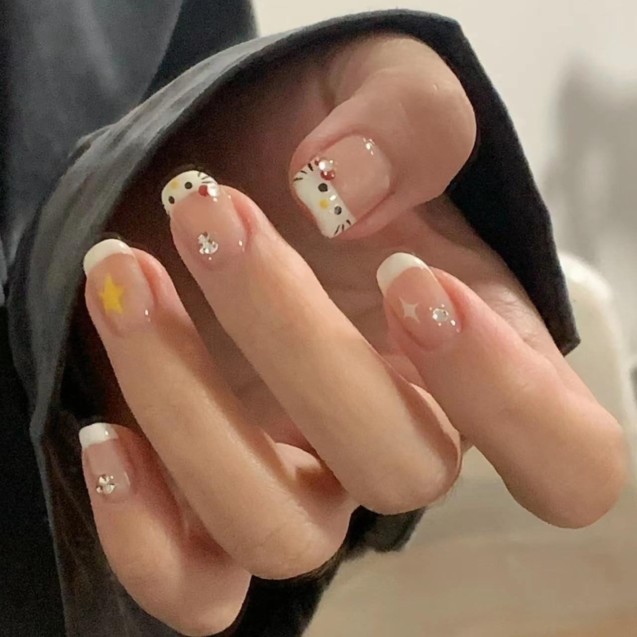 Short Almond Nails With Hello Kitty Faces And Rhinestones Short Almond Nails With Hello Kitty Faces And Rhinestones — Nails for Kids