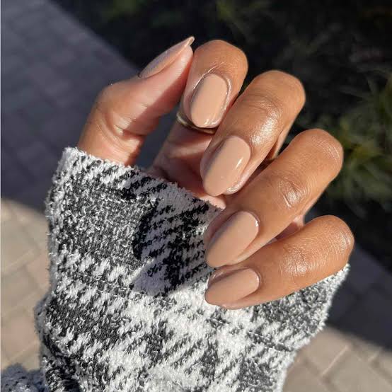 Medium Warm Nude Glossy Short Almond Nails Medium Warm Nude Glossy Short Almond Nails — Nails for Tan Skin