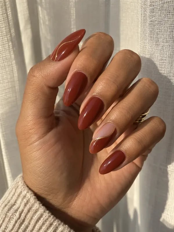 Deep Red Medium Almond With Thin Gold Line Accent Deep Red Medium Almond With Thin Gold Line Accent — Nails for Tan Skin