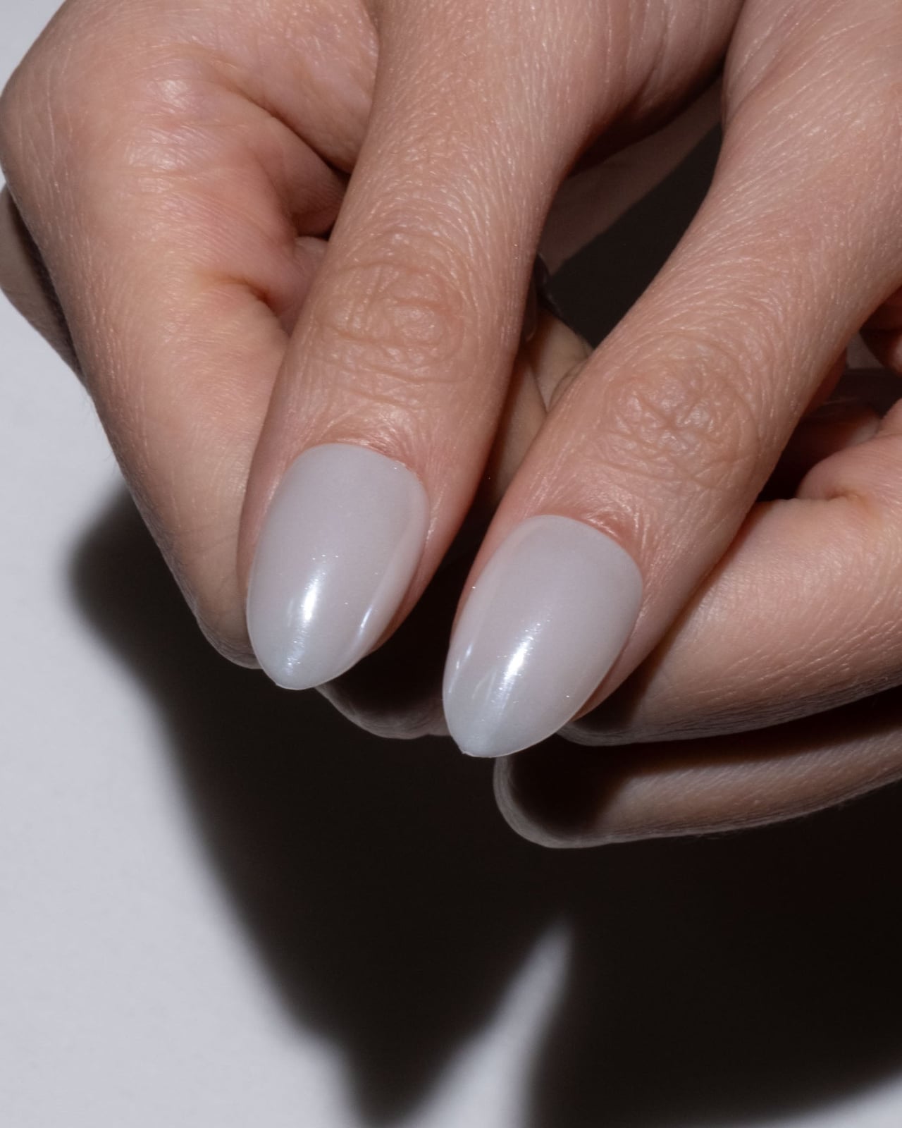 Pearlescent Milky White Shimmer Medium Oval Nails — Nails for Women Over 50
