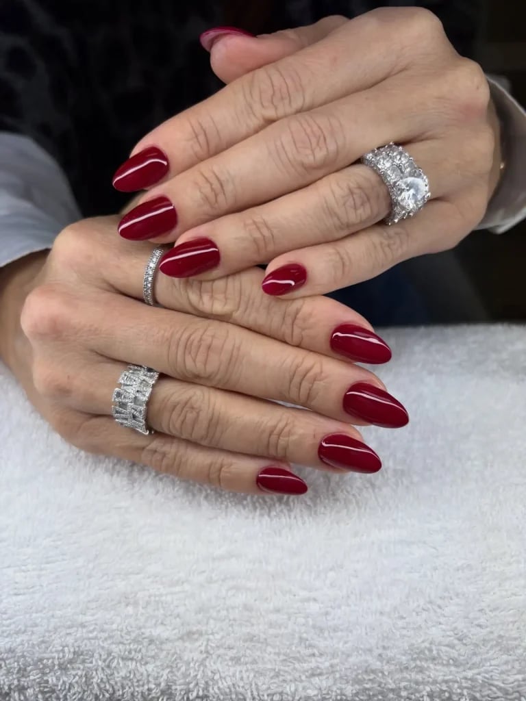 Deep Red Glossy Short Oval Nails, Textured Towel — Nails for Women Over 50