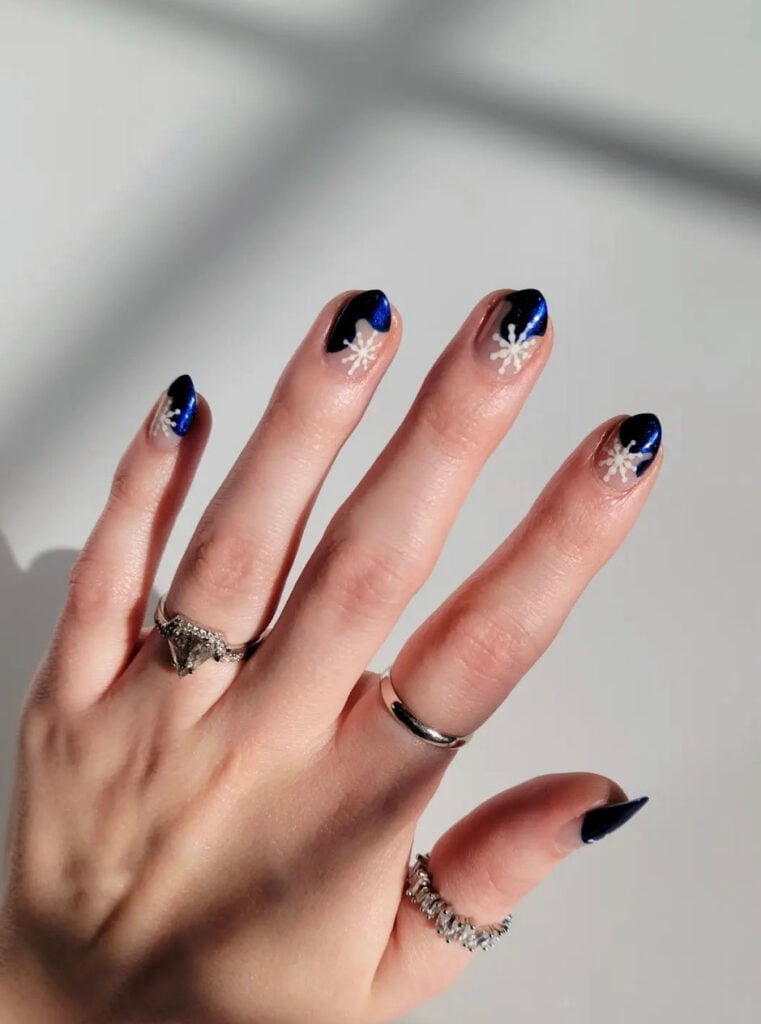 Medium Almond Navy Blue Snowflake Nails Medium Almond Navy Blue Snowflake Nails — New Years Nails