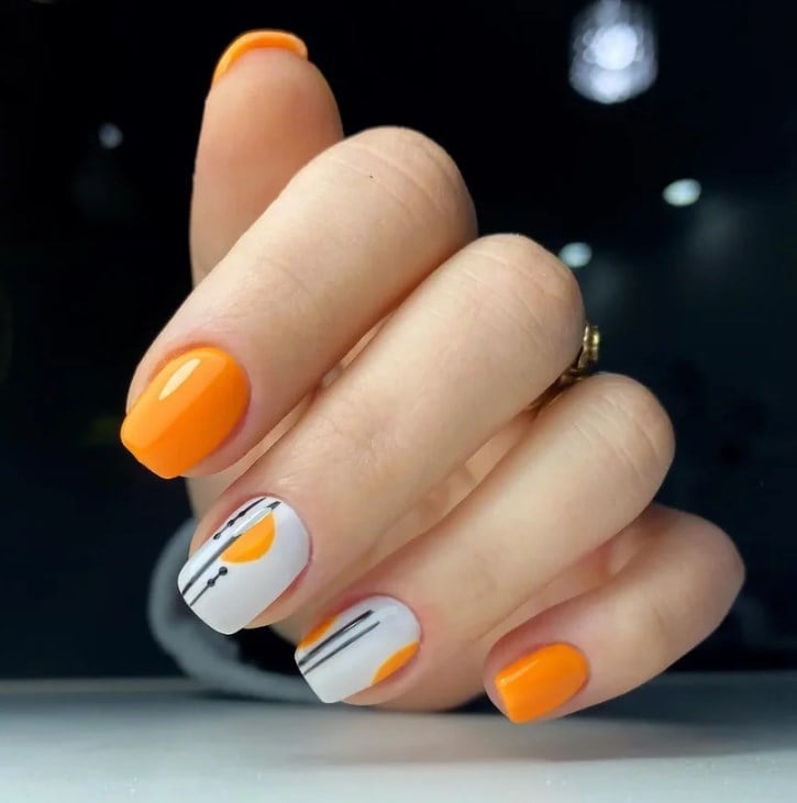 Bright Orange Glossy Nails with Geometric Accents — Orange Nails