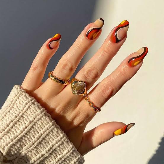 Burnt Orange Abstract Swirl Medium Almond Nails — Orange Nails