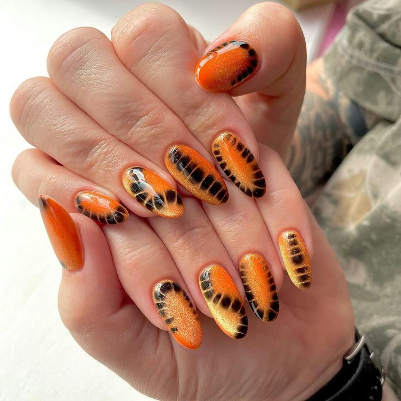 Shimmering Orange Tiger Stripe Medium Almond Nails — Orange Nails