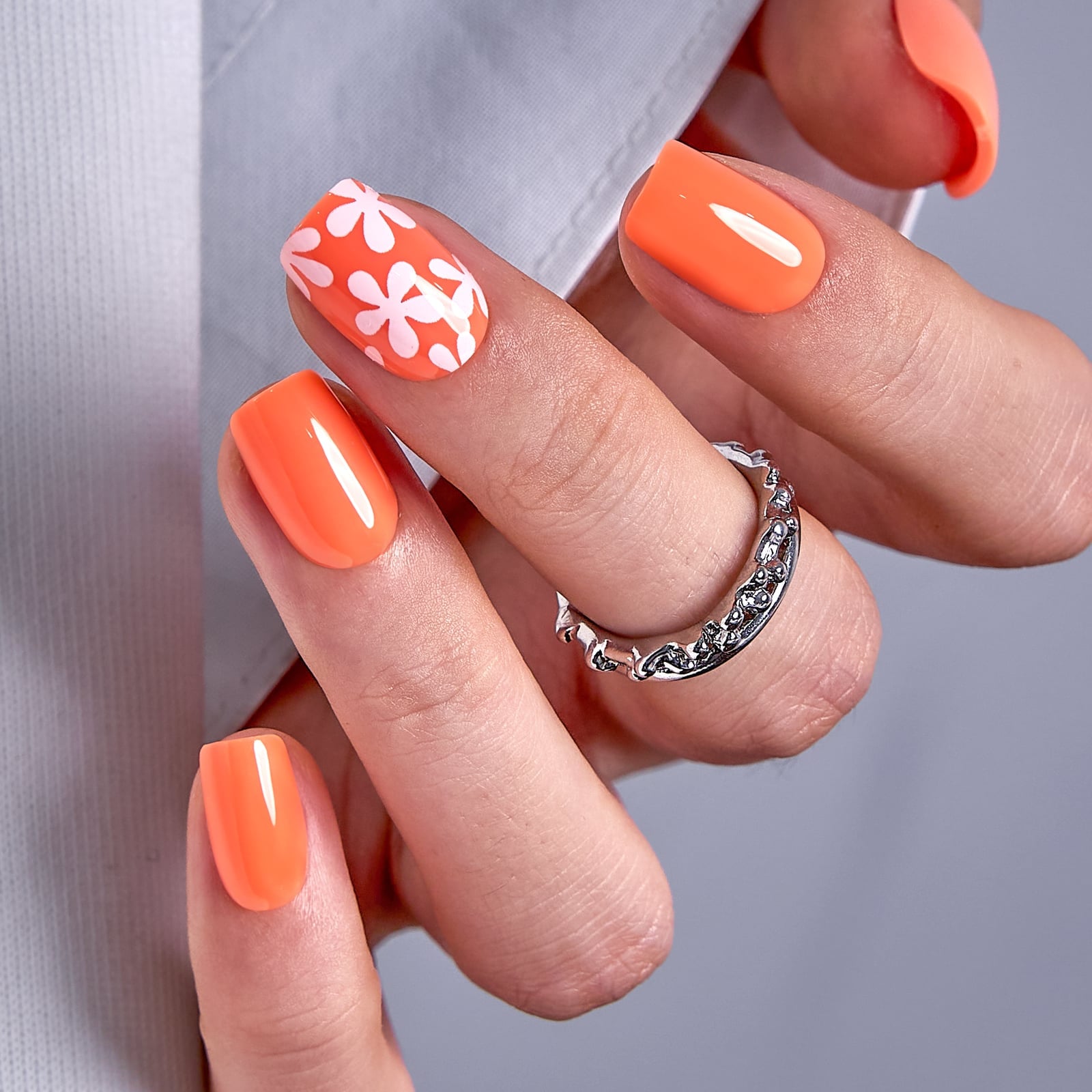 Bright Orange Glossy Nails with Daisy Accent, Short Squoval — Orange Nails