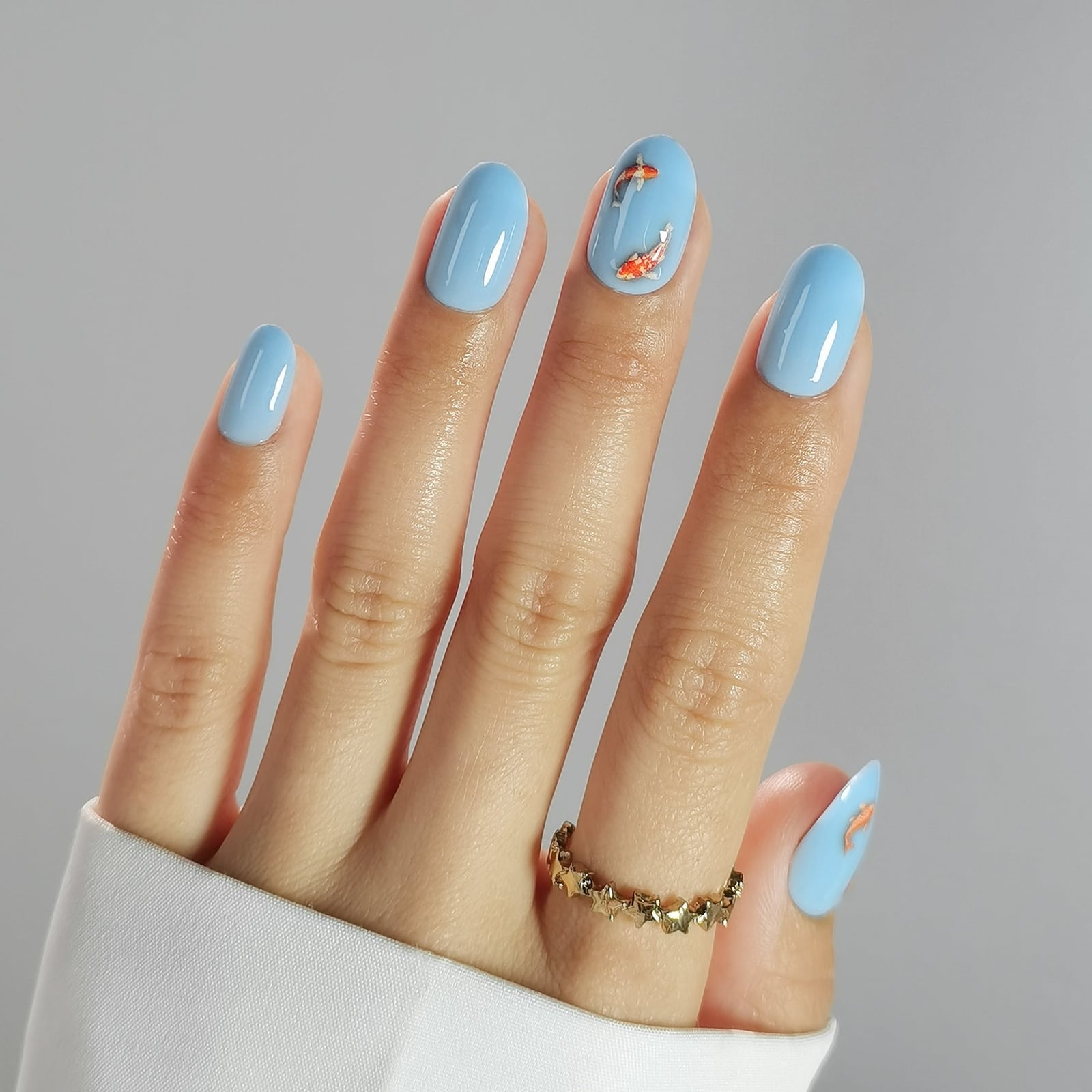 Short Oval Light Blue Koi Fish Nails — Oval Nails