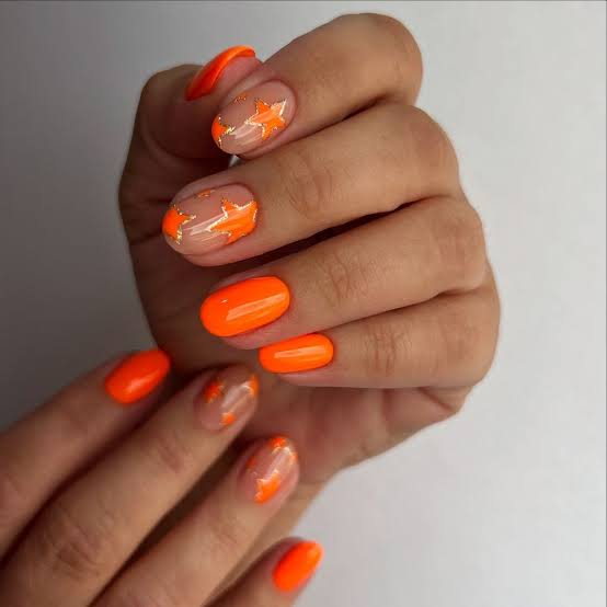 Short Oval Bright Orange Star Nails — Oval Nails