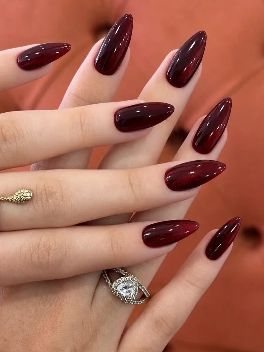 Short Almond Subtle Red Shimmer Cat Eye Nails — Oxblood Nails