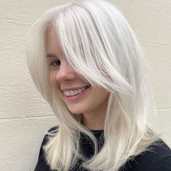Collarbone Layers With Curtain Bangs Collarbone Layers With Curtain Bangs — Scandi Blonde