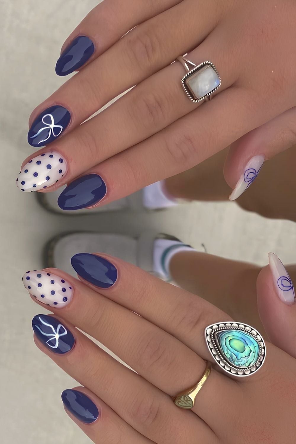 Medium Almond Navy Blue White Polka Dot Bow Nails — School Nails